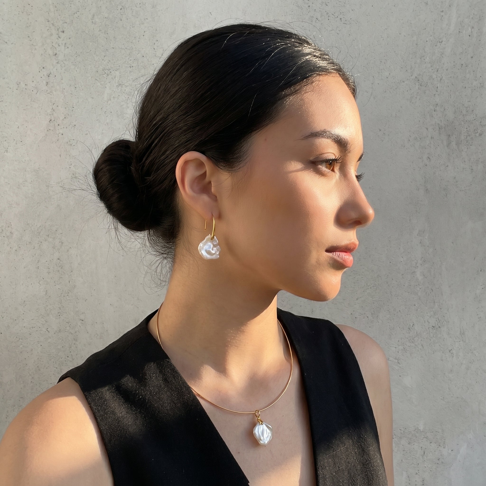 The Earring Collection: Framing the Asymmetric